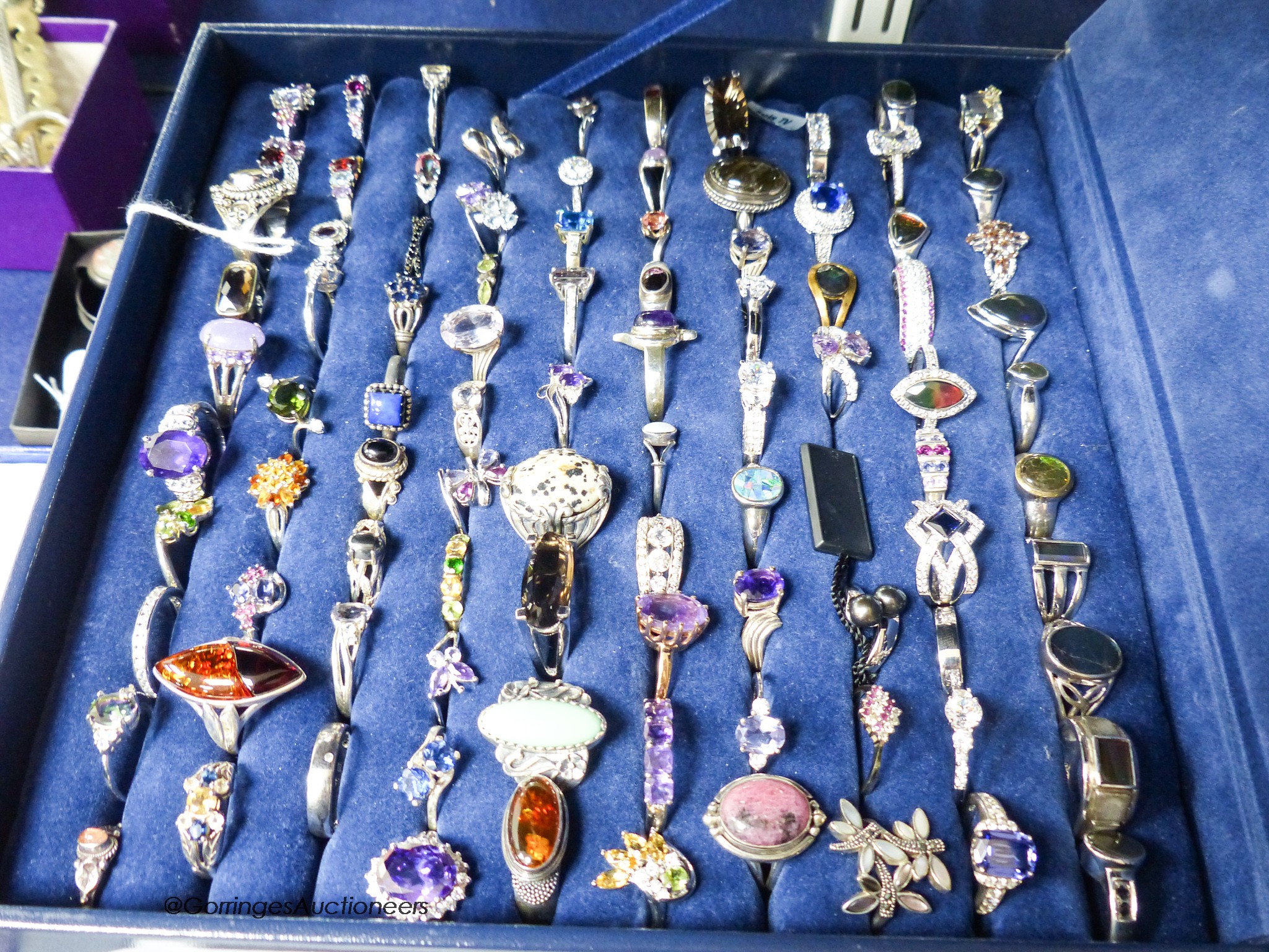 One hundred and sixty two modern 925 dress rings, thirty four other dress rings and assorted necklaces etc.